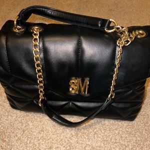 Steve Madden hand bang